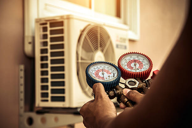 Professional Air Conditioning Service technician working in Lisle, IL